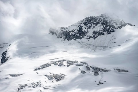 Snow and glacier ice with crevasses on the Waxeggkees glacier, Berliner Höhenweg, Zillertal Alps,