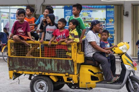 Children on a vehicle in an Indonesian village, village, child, boy, curious, curiosity, childhood,