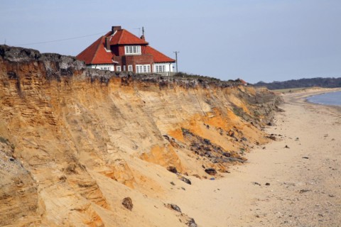 House on cliff top subsequently demolished in March 2011 because of coastal erosion, Easton