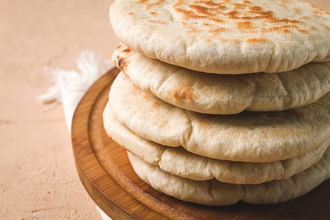 Pita bread, stack, on the table, no people