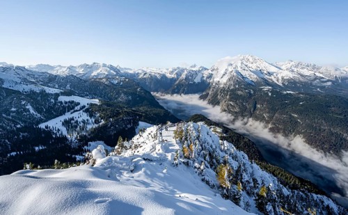 Snow-covered summit of the Jenner with viewing platform in autumn, view of the sea of clouds and