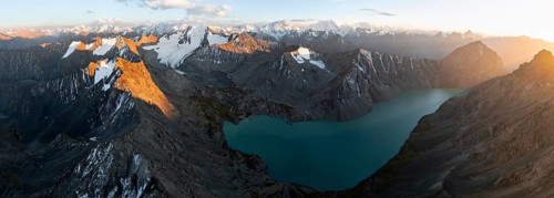 Evening mood, mountain panorama, aerial view, 4000 metre peak with glacier, mountain pass and