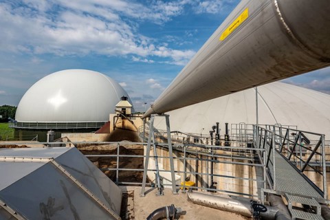 Biogas plant, gas storage, with dome, use of solid manure as energy source, gas pipelines, on a