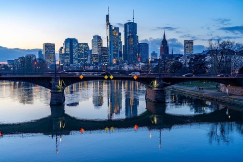 Skyline of the city centre of Frankfurt am Main, river Main, dusk, Ignatz-Bubis-Brücke, Hesse,