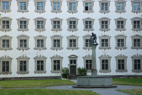 Inner courtyard with fountain and baroque illusion architecture, illusion painting, window, row,