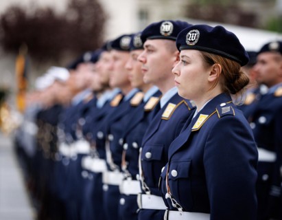 Female air force soldier and comrades of the guard battalion, taken during the final roll call of