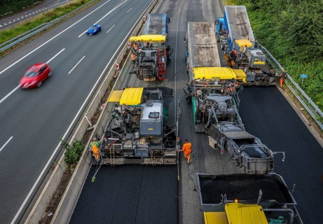 Essen, North Rhine-Westphalia, Germany, Road construction, Asphalt pavers and road rollers lay new,
