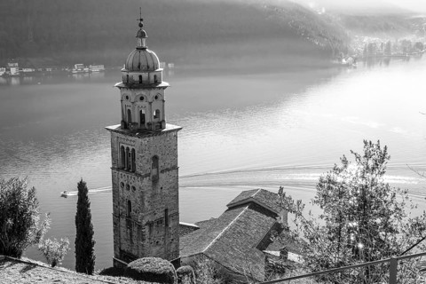Church Tower Santa Maria del Sasso with Sunlight and Mountain on Lake Lugano in Morcote, Ticino in