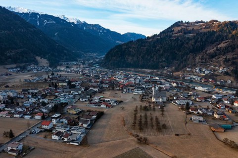 Drone shot, view of village with parish church, Prutz, Kaunertal, Inntal, Tyrol, Austria, Europe