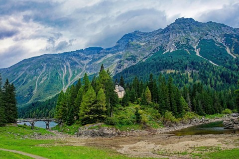 Lake chapel Maria am See, Obernberger See, mountain lake, landscape of the Stubai Alps, weather