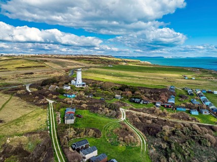 Portland Bird Observatory from a drone, Bill Lighthouse, Portland Bill, Isle of Portland, Dorset,