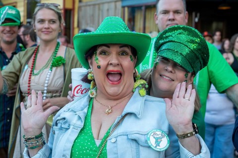 New Orleans, Louisiana - Spectators line the sidewalks as the Downtown Irish Club holds its St
