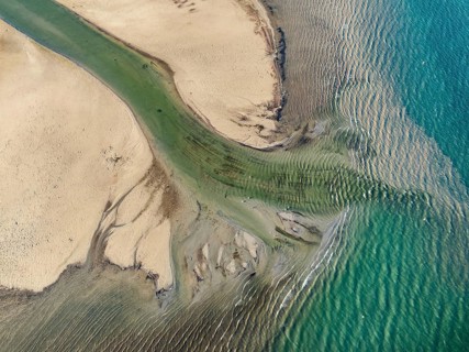 Aerial photograph, top down view of the Radolfzell Aach estuary with current lines, structures,
