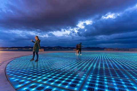 Artwork and solar installation Greeting to the sun at dusk, Zadar, Croatia, Europe