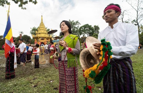 NAMSAI, INDIA.- APRIL 16: Devotees celebrate the vibrant Sangken Festival at Golden Pagoda in