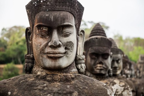 Figures on the bridge to Angkor Thom, sunset, Angkor Wat, Angkor, UNESCO World Heritage Site, Siem