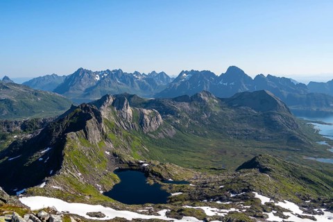 Mountains and fjord landscape, view from the summit of Rundfjellet, fjord Austenesfjord and lake