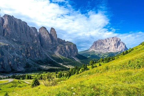 Majestic peaks and lush meadows create a stunning panorama in the heart of the italian dolomites,