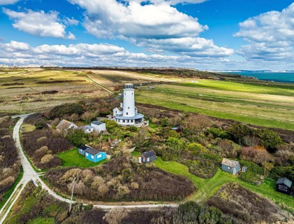 Portland Bird Observatory from a drone, Bill Lighthouse, Portland Bill, Isle of Portland, Dorset,