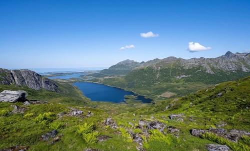 View of mountain landscape and valley with lakes, hiking trail to the summit of Rundfjellet,