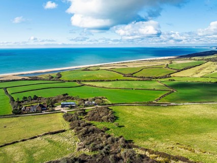 Farms over Swyre and West Bexington from a drone, West Bexington Nature Reserve, S W Coast Path,