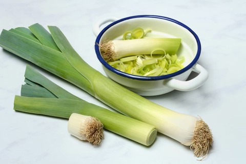 Leek, leek sticks and leek rings in a bowl