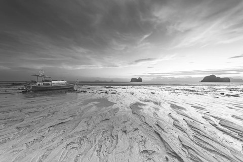 Structures in the sand, sunrise at low tide on the beach of Koh Ngai Island, Andaman Sea, Satun