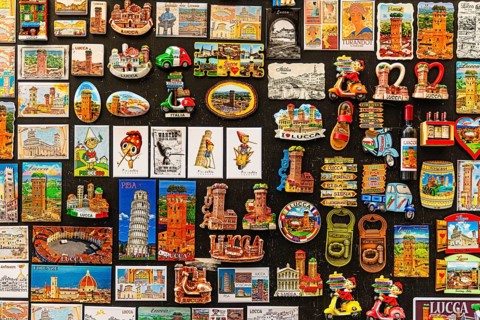 Magnetic boards with Tuscan motifs in a souvenir shop, historic city centre, Lucca, Tuscany, Italy,