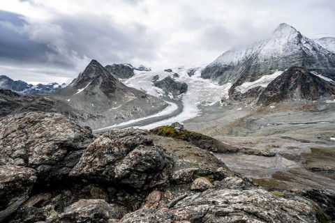 Mountain hut Cabane des Dix in front of glacier Glacier de Cheilon and summit Mont Blanc de