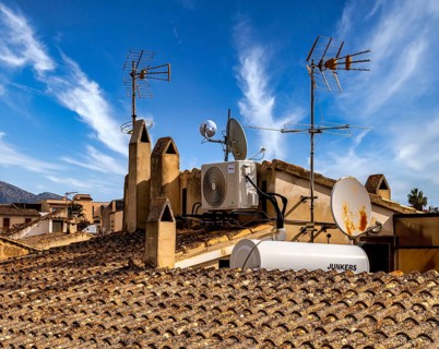 View of Mediterranean houses, roofs and courtyards from the town wall, Alcudia, Majorca, Spain,