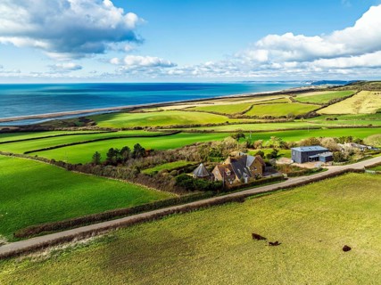 Farms over Swyre and West Bexington from a drone, West Bexington Nature Reserve, S W Coast Path,