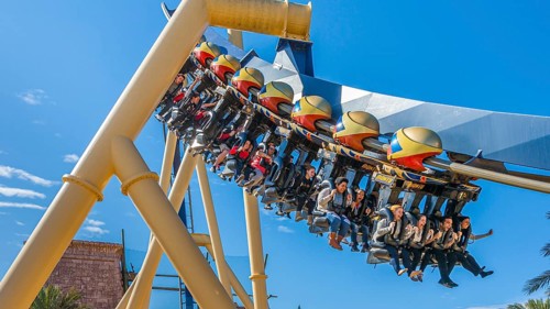 Park guests riding Montu roller coaster at Busch Gardens in Tampa, Florida, USA, North America