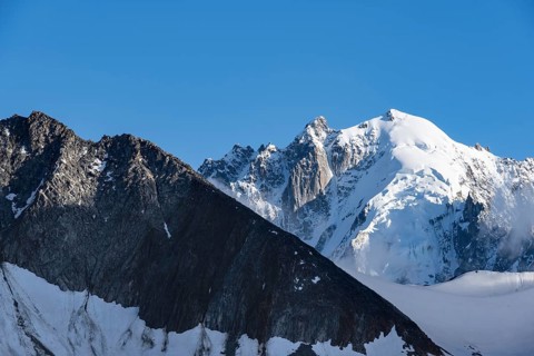 Summit of the Aiguille Verte, High alpine mountain landscape with glacier and mountain peak,