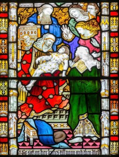 Detail of stained glass east window church of All Saints, Rede, Suffolk, England, UK, 2 Kings 4:20