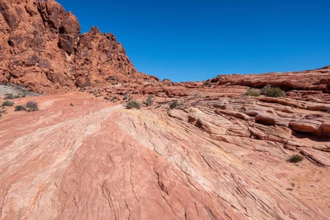 Layered rock formations along the Fire Wave Trail at Valley of Fire State Park near Overton, Nevada