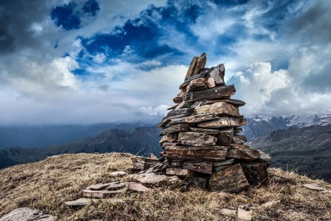 Stone cairn in Himalayas mountains. Himachal Pradesh, India, Asia