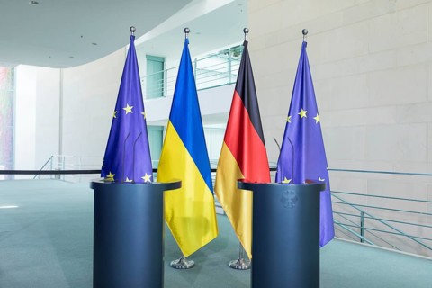 Flags of the European Union (EU), Ukraine and the Federal Republic of Germany in front of the joint