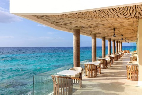 Mexico, Cozumel beach cafes and restaurants with scenic ocean views and national food and drinks,