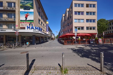 Pedestrian zone Kortumstrasse with the photo shop Hamer in Bochum, Ruhr area, independent city,