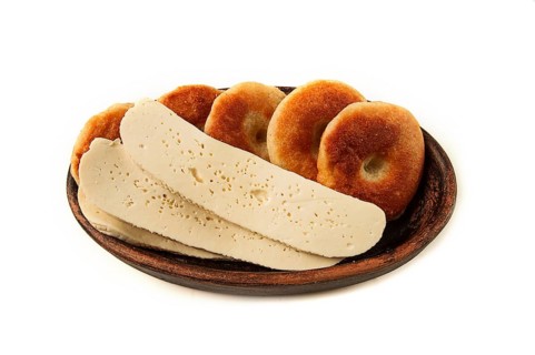 Mchadi, corn tortillas, traditional Georgian dish, corn bread, with Imeretian cheese, homemade, no