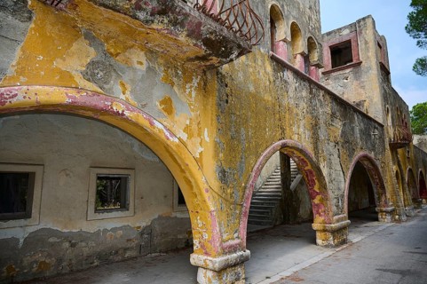 Abandoned architecture with dilapidated arches showing historical traces and long neglect, Italian