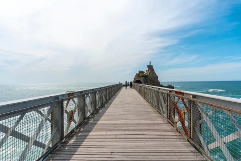 Wooden bridge together to Plage du Port Vieux in Biarritz, holiday in south-eastern France.