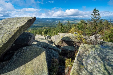 View from the Kösseine over the forests of the Fichtelgebirge, sea of boulders on the summit,