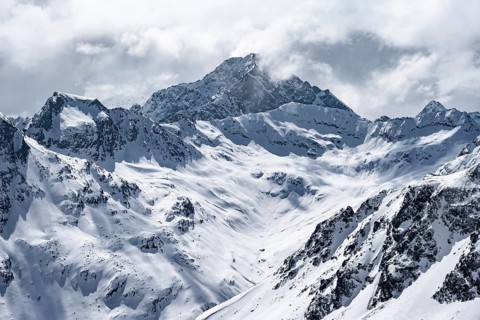 View at the summit of Piz Laviner, mountain panorama in winter, mountain landscape with mountain