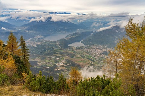 View from the summit of Mount Pizzo di Levico to the lakes in the Sugana Valley, Trentino, Italy,
