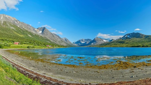 Lyngen Alps at the Lyngenfjord, Lyngen Alps, mountains with snow, blue sky, European North Sea,