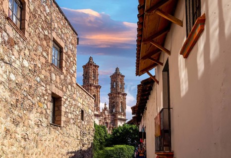 Mexico, Scenic Taxco colonial architecture and cobblestone narrow streets in historic city center