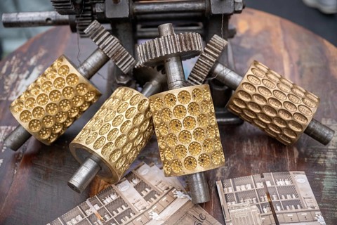 Profiled metal rollers, machine parts, embossing rollers, brass matrices for the production of