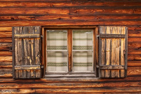 View of the window of a hut on the Glatsch Alm, Dolomites, Puez-Geisler nature park Park, Odle