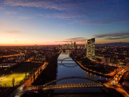 The lights in the offices of the European Central Bank (ECB) and in the skyscrapers of Frankfurt's